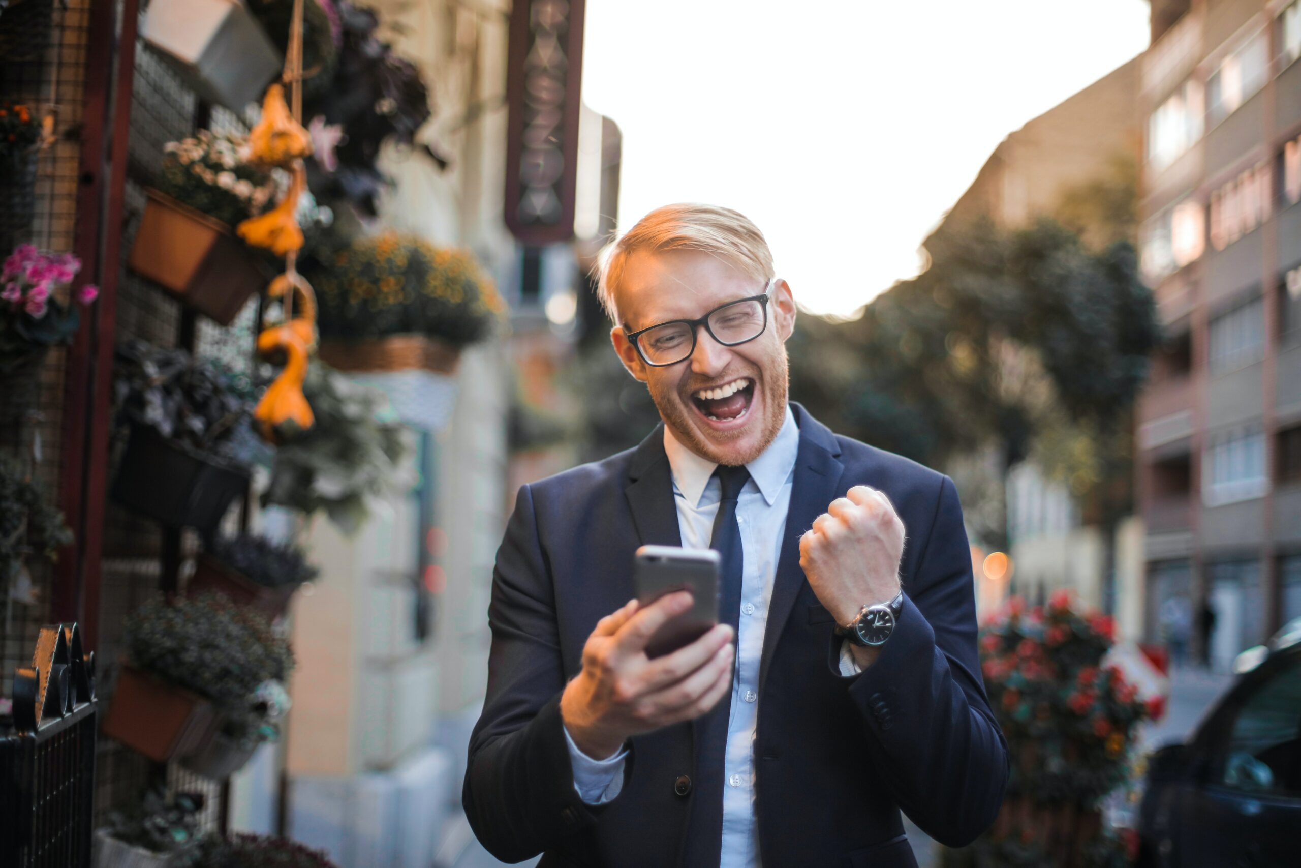 Image of a person reading news on their smartphone.